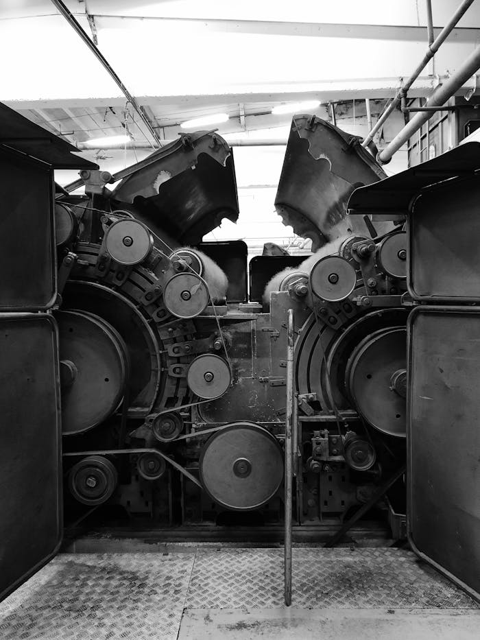Black and white photo featuring intricate industrial machinery with a vintage feel.